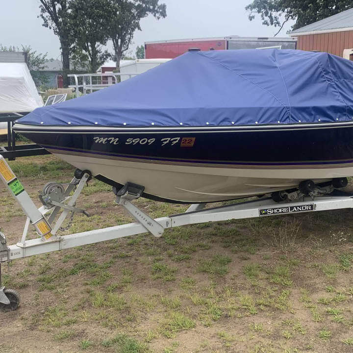 Dark blue boat cover on a boat